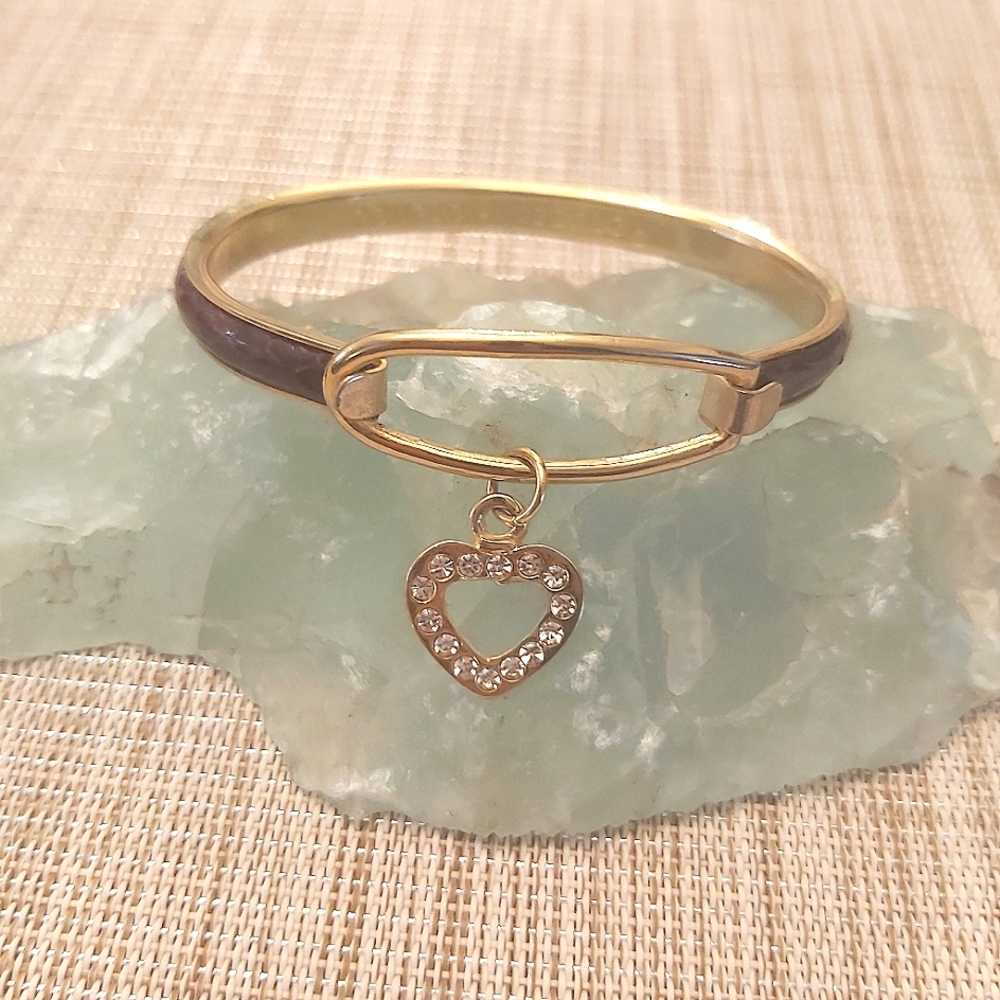 Vintage Peruzzi Florence Italy goldtone snakeskin hinged bangle bracelet